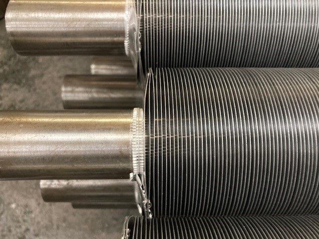 Photo of many Steel Tubes with Aluminium LL Fin